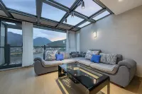 簡藍·Luxury山景親子度假民宿（安吉雲上草原熊貓部落探險樂園店） 浪漫山川景區住宿飯店