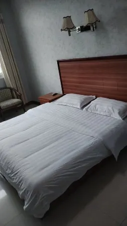 WeiLong Hotel Отели в г. Сися