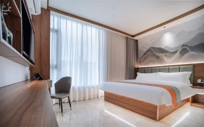Wu Ming Holiday Hotel -LRB-bus statKangkang he city hotel Hotel in zona CPC Wuming County Committee Party School