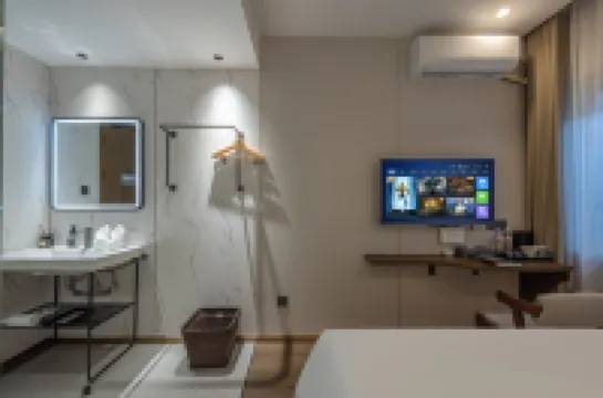 เซอร์วิสอพาร์ตเมนต์จูกวงซือเย่ (สถานีรถไฟใต้ดินทีหยูกวน)