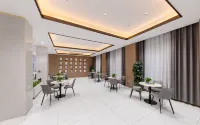 Guoyun Hotel (Dengzhou Renmin Road Bureau of Commerce)