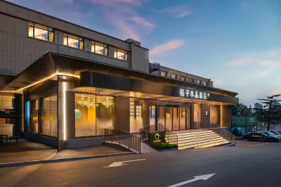 Qingdao Wusi Square Wheat Island Orange Crystal Hotel Hotel a Qingdao