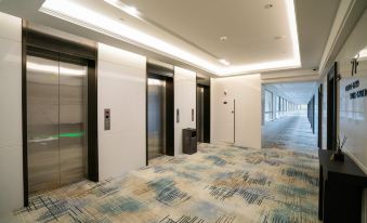 Xiaocheng International Apartment Hotel
