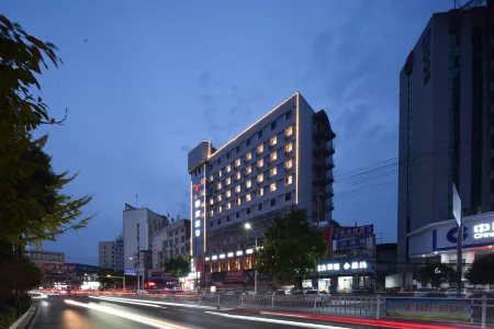 Qihuan Hotel (Xishui Runda International Shopping Center) Отели в г. Сишуй