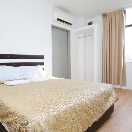Grand Inn Hotel - Macalister Road Отели рядом с достопримечательностью «Особняк Саффолк-хаус»
