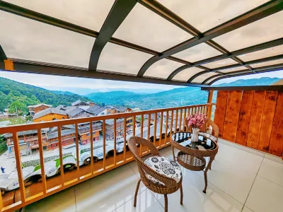 Zhaoxing Tang'an Zui Xiyang Homestay Отели рядом с достопримечательностью «Дон Ань Камбоджа»