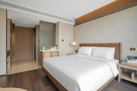 Mile Bonny Hotel Отели рядом с достопримечательностью «Honghe Nativeland»