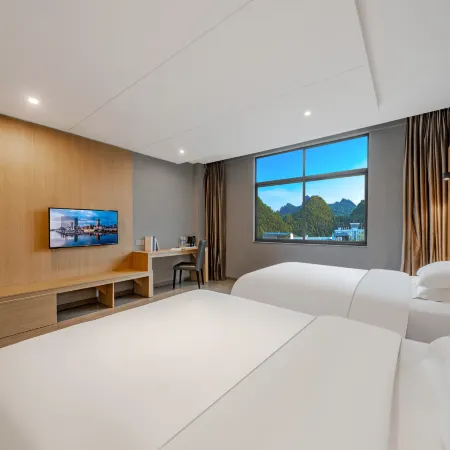 Guangzhou Jiulong Hotel ( Zhenfeng Middle School) Отели в г. Чженьфен