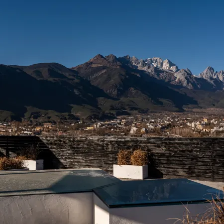 Experience the breathtaking panorama of snow-capped mountains in a luxurious villa.