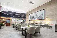 Loudi 418 Huatian Grand Hotel - فطور