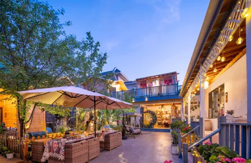 Tekes Muzi Bieyuan Homestay (Baguacheng Lijie Branch)