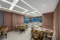 Magnotel Hotel (Zhushan Bus Passenger Station Shiyang Road) - فطور