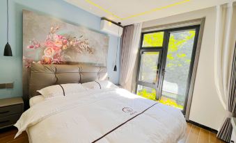 Yueman Xiaozhu (Huanghuacheng Water Great Wall Store)