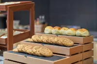 Jiulong Yipin Hotel (Zhijin Ancient City Pedestrian Street) - servizio colazione