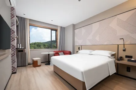 Borrman Hotel (Wuhan Wenhua Avenue Zhongbai Plaza) Отели рядом с достопримечательностью «Wuhan Institute of Engineering and Technology Teaching Building 3»