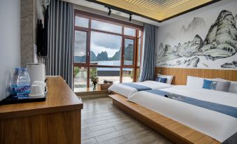 Yangshuo Homecoming Hotel (Jinlongqiao Wharf Bamboo Rafting Branch)