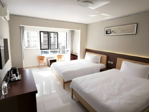 暖嘉旅舍（大季家高鐵站蓬萊機場店） 煙台蓬萊國際機場附近的飯店