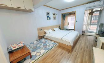 Xigu Yihao Hot Spring Vacation Apartment