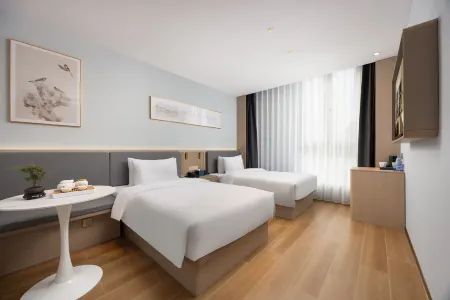 Mujiangnan Hotel (Taizhou Medical City Oriental Town Branch) Отели рядом с достопримечательностью «Jiangsu Pastorage - Gymnasium»