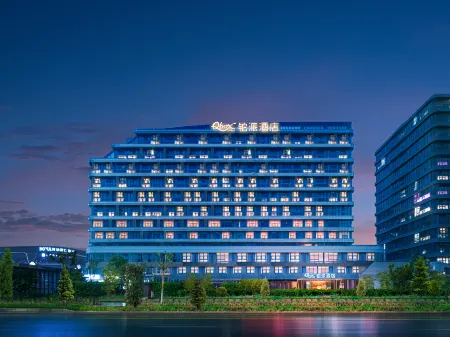 Ningbo Happy Coast Q-Box Hotel (Yinzhou Wanda Plaza) Отели рядом с достопримечательностью «The University of Nottingham Ningbo»