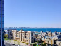 海眠庵｜HighSeaViewApartmenデザイナーズ民宿（大連東港ヴェネツィア水城） - 民泊