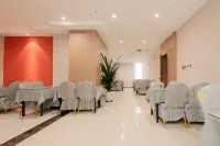 Bahrain Youqi Victory Business Hotel - servizio colazione