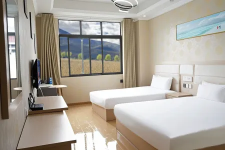 Ming Zhu Holiday Hotel Отели рядом с достопримечательностью «Banghe and Sela»