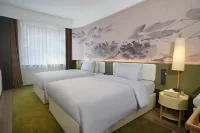 Renjoy Hotel (Luoyang Xiaojie Tianfu Railway Station) Hotels in Downtown Area