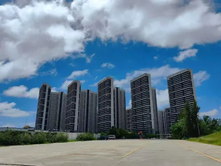 Huajing Seaside Holiday Apartment Отели рядом с достопримечательностью «Loong Bay International Ocean Resort»