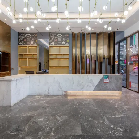 Chaoman Hotel (Shenzhen Baoan Daqianli Pingzhou Subway Station) Отели рядом с достопримечательностью «Станция метро Pingzhou »