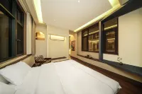 彌勒一方庭設計師民宿（紅河水鄉錢王門店）