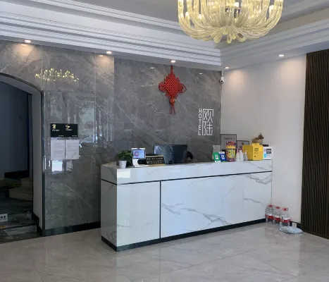 Oulu Liangshe Hotel (Zhanqiao Railway Station)