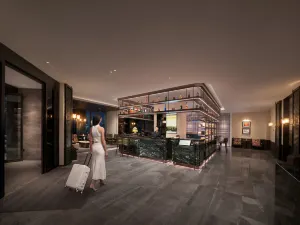Daqing Yufeng Hotel (Sartu Xinmati Leisure Shopping Plaza)