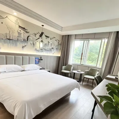 Huaju Hotel (Haining Haichang Road subway station store) Hotels near Parkson