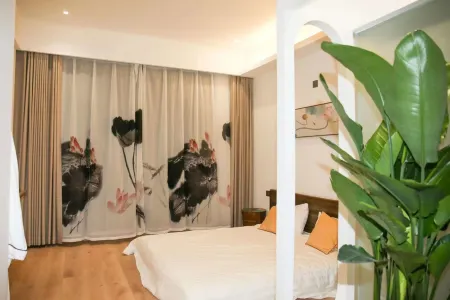 Qingxin Yashe Homestay Отели рядом с достопримечательностью «Huzhen Station»