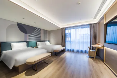 Orange Hotel (Weihai Wendeng Mishan Road Branch) Отели рядом с достопримечательностью «Aodaliya Kunshilan Occupation Technology (Nan'an) College Weihai Branch»