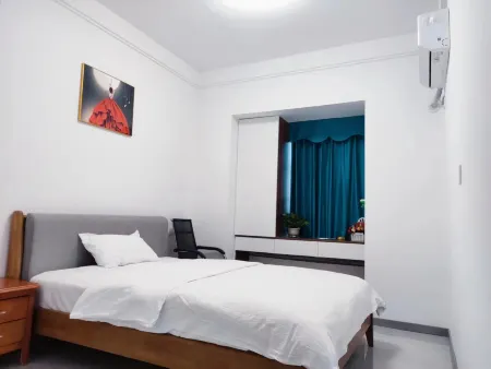 Meiyuan Apartment Отели рядом с достопримечательностью «Mechanical and Electronic Engineering Department of Huanggang Polytechnic College»