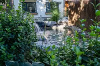 Floral Hotel·Lanting Hot Spring Hotel(Mutianyu Great Wall shops) Hoteller i Huairou District