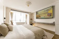 Mutang Design Guesthouse (Leshan Railway Station Shihao Plaza) - โฮมสเตย์
