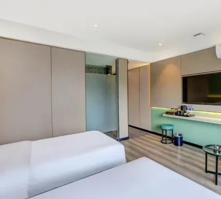 Leyou Smart Hotel (Harbin West Station Haxi Wanda) Отели рядом с достопримечательностью «Harbin Railway Vocational and Technical College»