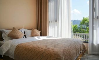 Hefeng Qingqing Xiaoyuan Homestay