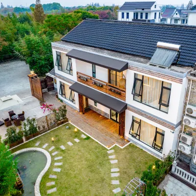Shanghai Muxi Garden Homestay (Chongming Forest Park) Hotels near Shanghai Genbao Football Base - Outdoor Football Stadium