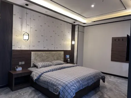 HuaXi  inn Отели в г. Вэйнань