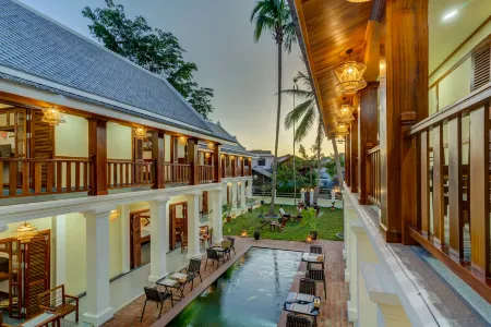Elegant Boutique Hotel Luangprabang Отели рядом с достопримечательностью «Wat Xieng Muan»