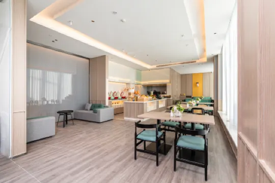 Country Inn & Suites by Radisson Hotel (Harbin Central Avenue Heshan Street Subway Station) Отели рядом с достопримечательностью «Tian Jiabing Gymnasium»