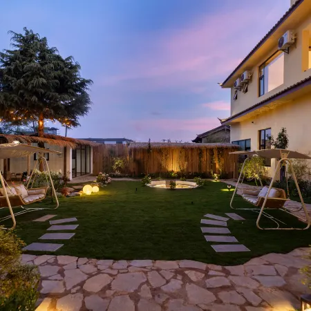Experience the breathtaking panorama of snow-capped mountains in a luxurious villa.