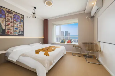 Zhouya Seaview Audio-Visual Vacation Homestay (Huoju 8th Street International Coastal Baths) 환취구 환해로 주변 호텔