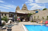 Grand Elite Cave Suites - bar