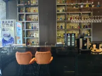 The GiorgioMorandi Hotels F (Shandong International Convention and Exhibition Center Store) - bar