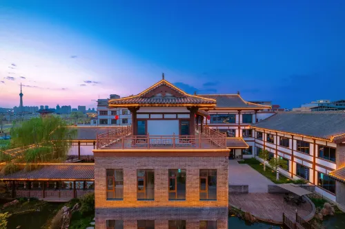 Luoyang Menggong Capital City Cultural Theme Hotel - bar
